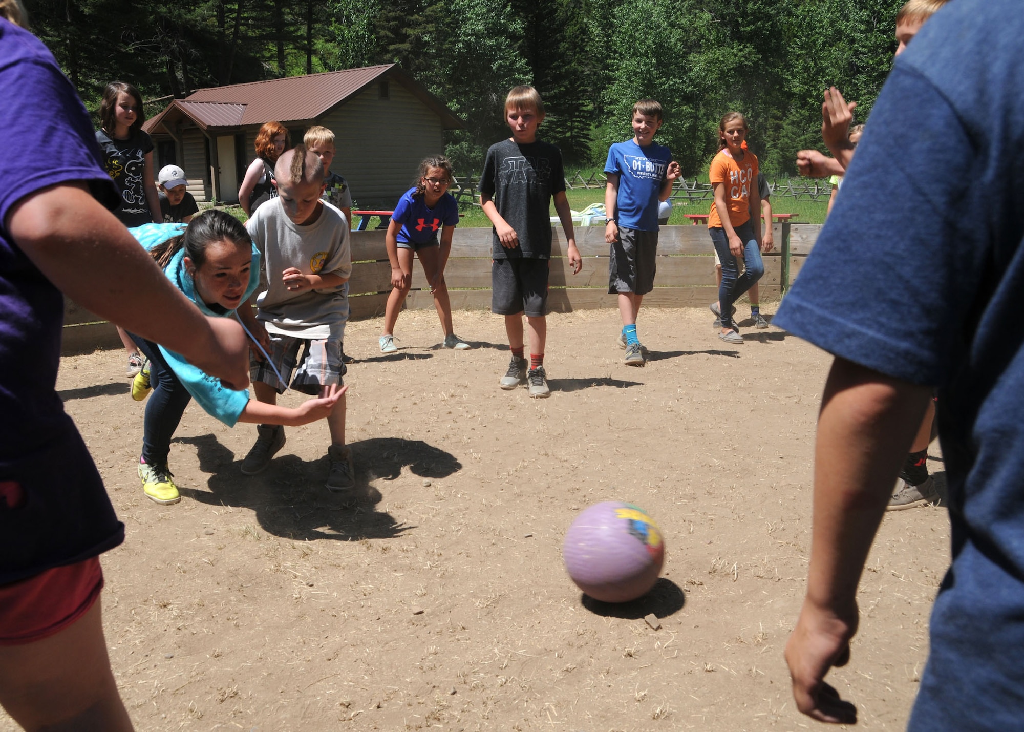 Kids play a form of dodgeball at Camp Runnamucka June 29, 2016. The week-long camp is designed for children of Montana National Guard children whose parents have deployed or will soon deploy. Camp Runnamucka is held each year at Camp Rotary located near Monarch, Mont. (U.S. Air National Guard photo by Senior Master Sgt. Eric Peterson)