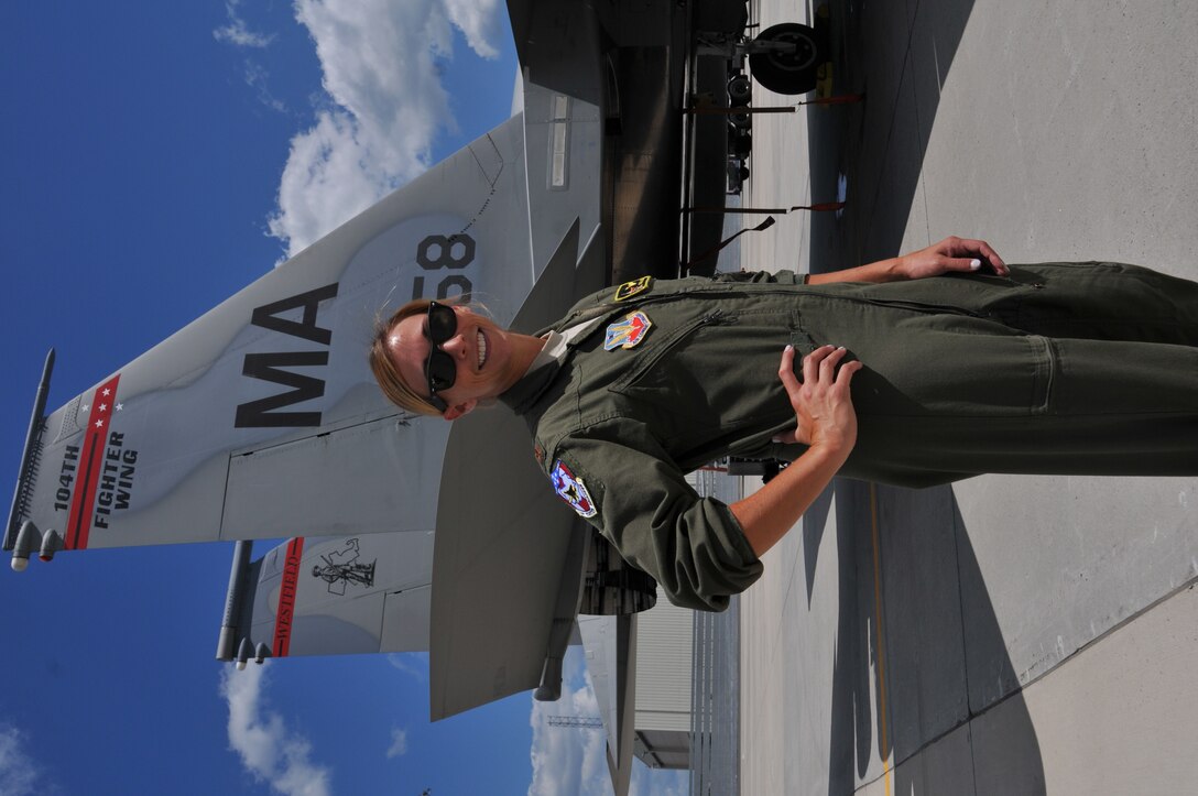 Maj. Ashley Rolfe is the first female fighter pilot for the Air National Guard’s 104th Fighter Wing. Rolfe is an Air Force Academy graduate and combat veteran who has served in the Air Force for eleven years. Rolfe became an Air Force pilot after growing up as an Air Force “Brat” dependent, following her dad and grandad’s footsteps carrying on the family legacy. Rolfe’s swearing in ceremony took place at Barnes Air National Guard Base, July 26, 2016. (U.S. Air National Guard Photo by Master Sgt. Julie Avey)  