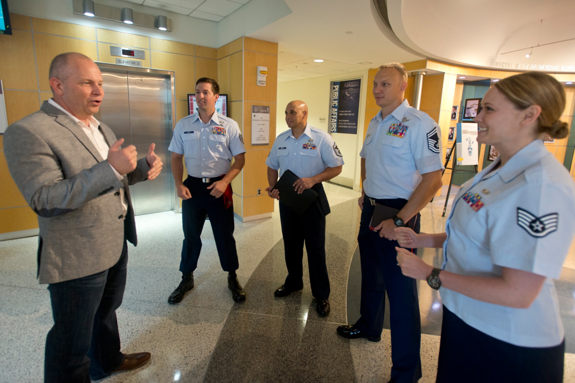 Retired Chief Master Sergeant James W. Hotaling, 11th command chief master sergeant of the Air National Guard talks with the ANG’s Outstanding Airmen of the Year at the start of Focus on the Force Week. Focus on the Force Week is a series of events highlighting the importance of professional development for Airmen at all levels, and the recognition of accomplishments throughout the enlisted corps. The OAY winners are Staff Sgt. Jennifer Masters, Airman of the Year; Tech. Sgt. Nicholas Jewell, Non-Commissioned Officer of the Year; Senior Master Sgt. Mark Farmer, Senior Non-Commissioned Officer of the Year; and Senior Master Sgt. Jack Minaya, First Sergeant of the Year. (U.S. Air National Guard photo by Master Sgt. Marvin R. Preston)