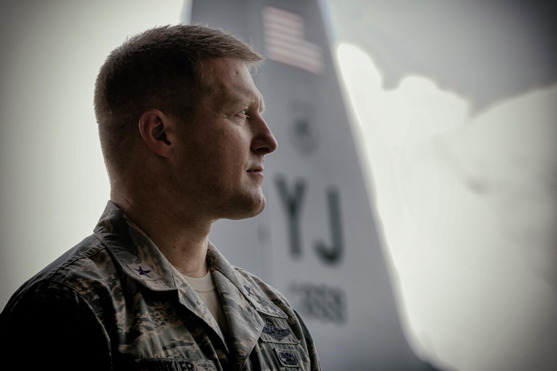 Brig. Gen. Michael Winkler, 5th Air Force vice commander, listens to a brief during his immersion tour at Yokota Air Base, Japan, Aug. 2, 2016. Winkler was previously the commander of the 354th Fighter Wing, Eielson Air Force Base, Alaska. (U.S. Air Force photo by Yasuo Osakabe/Released)  