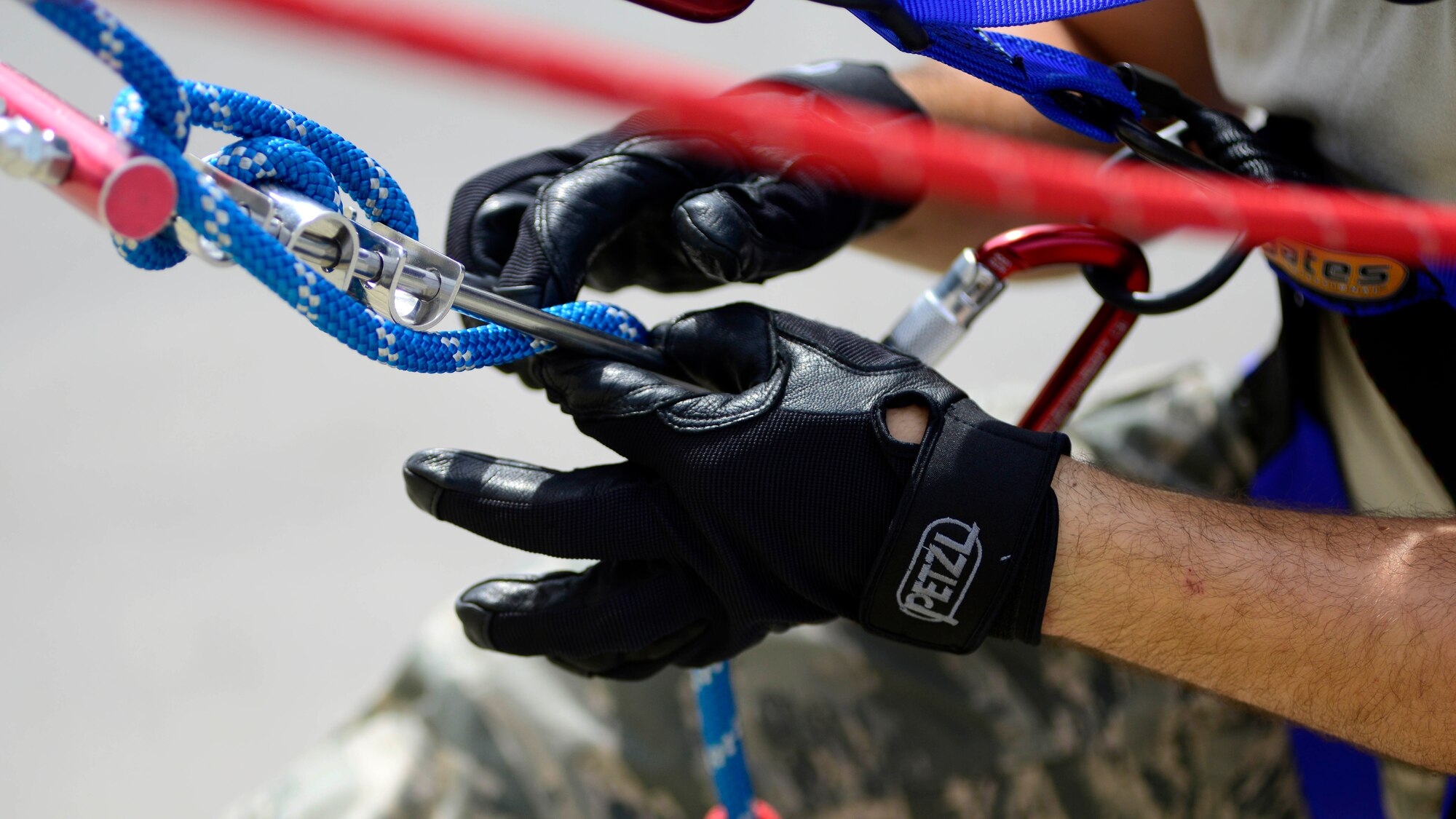 A firefighter from the 31st Civil Engineer Squadron rappels down the side of a building during a Rescue Technician One course, Aug. 8, 2016, at Aviano Air Base, Italy. Instructors from the 435th Construction and Training Squadron from Ramstein Air Base, Germany are conducting a 15-day course that teaches firefighters unique rescue techniques. (U.S. Air Force photo by Senior Airman Areca T. Bell/Released) 
