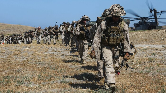 Marines with 3rd Battalion, 1st Marine Regiment line up to board an aircraft during a training exercise, aboard Marine Corps Base Camp Pendleton, Calif., July 28. Marine Heavy Helicopter Squadron (HMH) 462 and the Royal Canadian Air Force supported 3rd Battalion, 1st Marine Regiment during Rim of the Pacific (RIMPAC) 2016. 