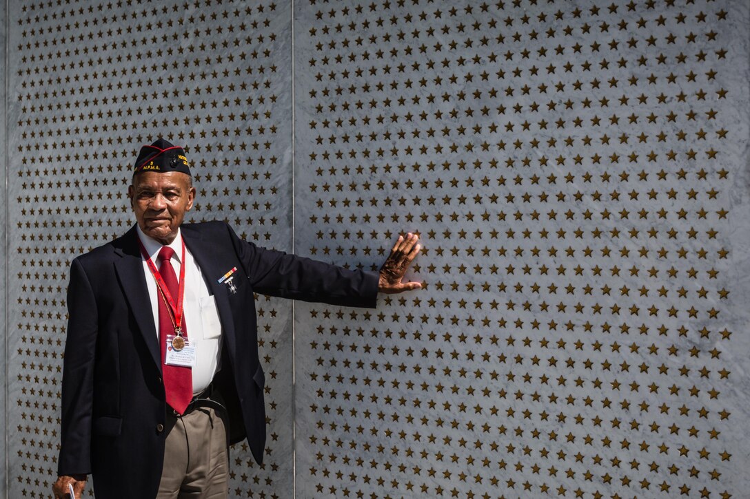 Rev. Wortham B. Fears with the Los Angeles Chapter of the Montford Point Marine Association pauses to remember his fellow Montford Point Marines who were unable to attend the Montford Point Marine Memorial Dedication at Marine Corps Base Camp Lejeune July 29. Hundreds of attendees, including Montford Point Marines, family members, active duty servicemembers and supporters, gathered to attend the memorial dedication which honored the 20,000 segregated African-American Marines who trained there in the 1940s. (U.S. Marine Corps photo by Lance Cpl. Sean J. Berry/Released)