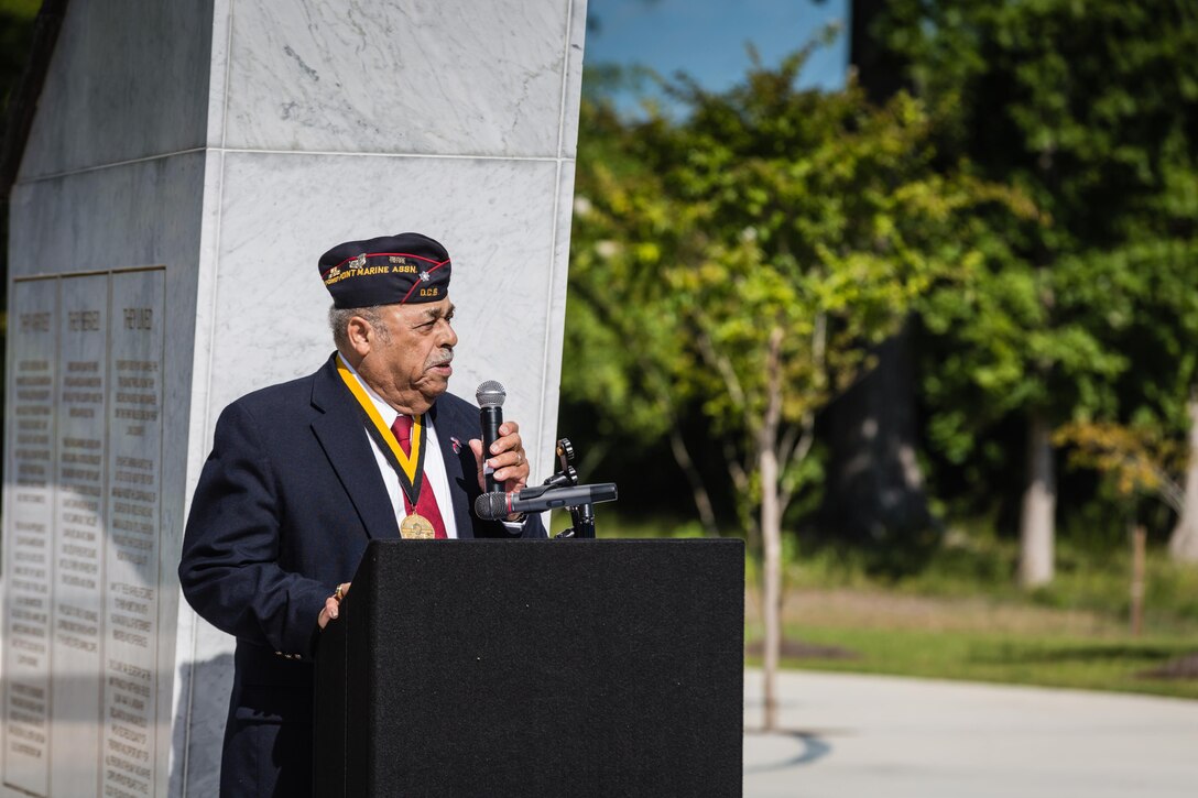 Retired Lt. Col. Joseph Carpenter with the National Montford Point Marine Association thanks those who donated and supported the establishment of the Montford Point Marine Memorial at a dedication ceremony at Marine Corps Base Camp Lejeune July 29. Hundreds of attendees, including Montford Point Marines, family members, active duty servicemembers and supporters, gathered to attend the memorial dedication which honored the 20,000 segregated African-American Marines who trained there in the 1940s. (U.S. Marine Corps photo by Lance Cpl. Sean J. Berry/Released)