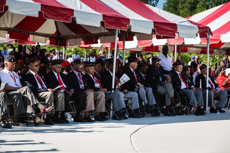 Marines with the National Montford Point Marine Association attend the Montford Point Marine Memorial Dedication at Marine Corps Base Camp Lejeune July 29. Hundreds of attendees, including Montford Point Marines, family members, active duty servicemembers and supporters, gathered to attend the memorial dedication which honored the 20,000 segregated African-American Marines who trained there in the 1940s. (U.S. Marine Corps photo by Lance Cpl. Sean J. Berry/Released)