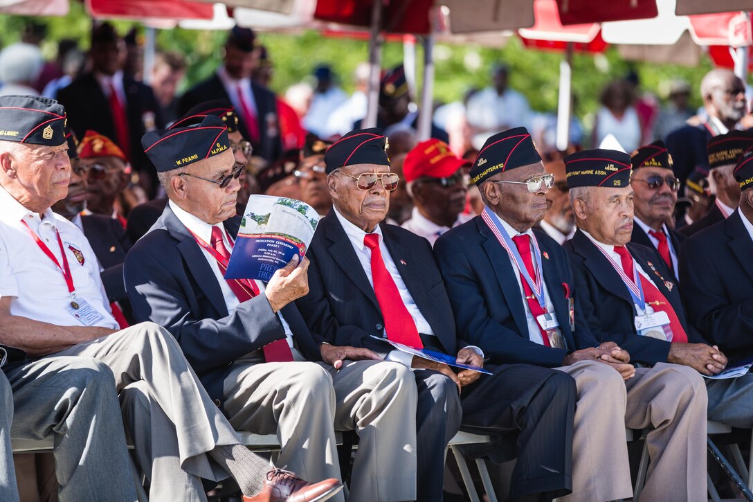 Marines with the National Montford Point Marine Association attend the Montford Point Marine Memorial Dedication at Marine Corps Base Camp Lejeune July 29. Hundreds of attendees, including Montford Point Marines, family members, active duty servicemembers and supporters, gathered to attend the memorial dedication which honored the 20,000 segregated African-American Marines who trained there in the 1940s. (U.S. Marine Corps photo by Lance Cpl. Sean J. Berry/Released)