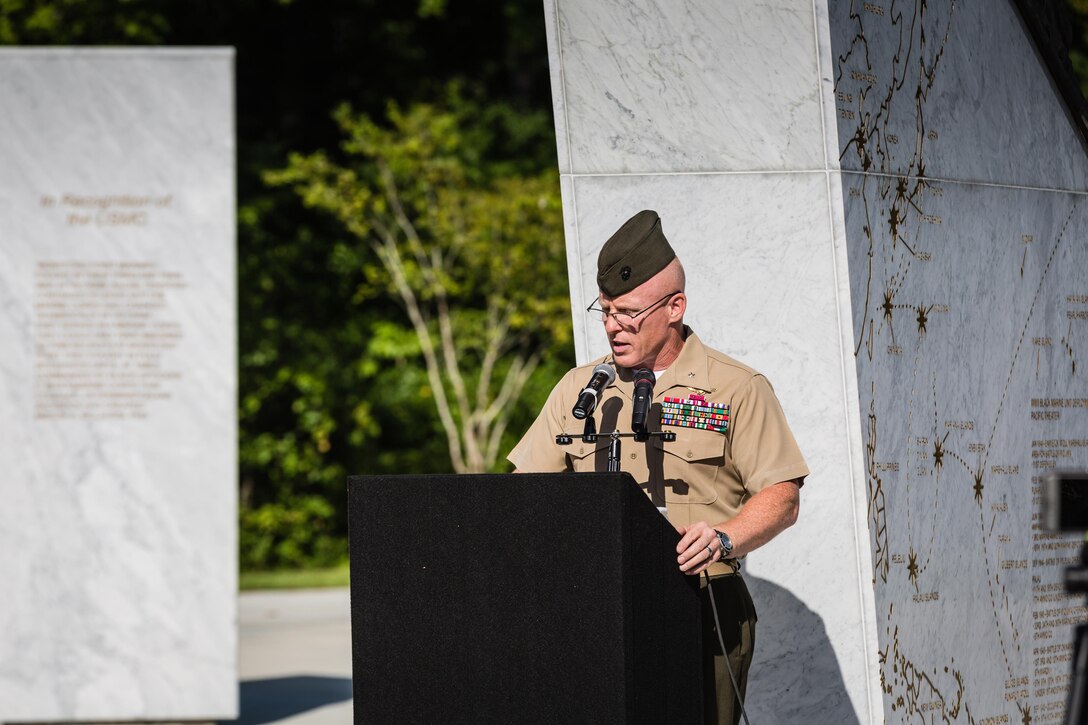 Brig. Gen. Thomas D. Weidley, Marine Corps Installations East – Marine Corps Base Camp Lejeune commanding general, welcomes the community to the Montford Point Marine Memorial Dedication at Marine Corps Base Camp Lejeune July 29. Hundreds of attendees, including Montford Point Marines, family members, active duty servicemembers and supporters, gathered to attend the memorial dedication which honored the 20,000 segregated African-American Marines who trained there in the 1940s. (U.S. Marine Corps photo by Lance Cpl. Sean J. Berry/Released)