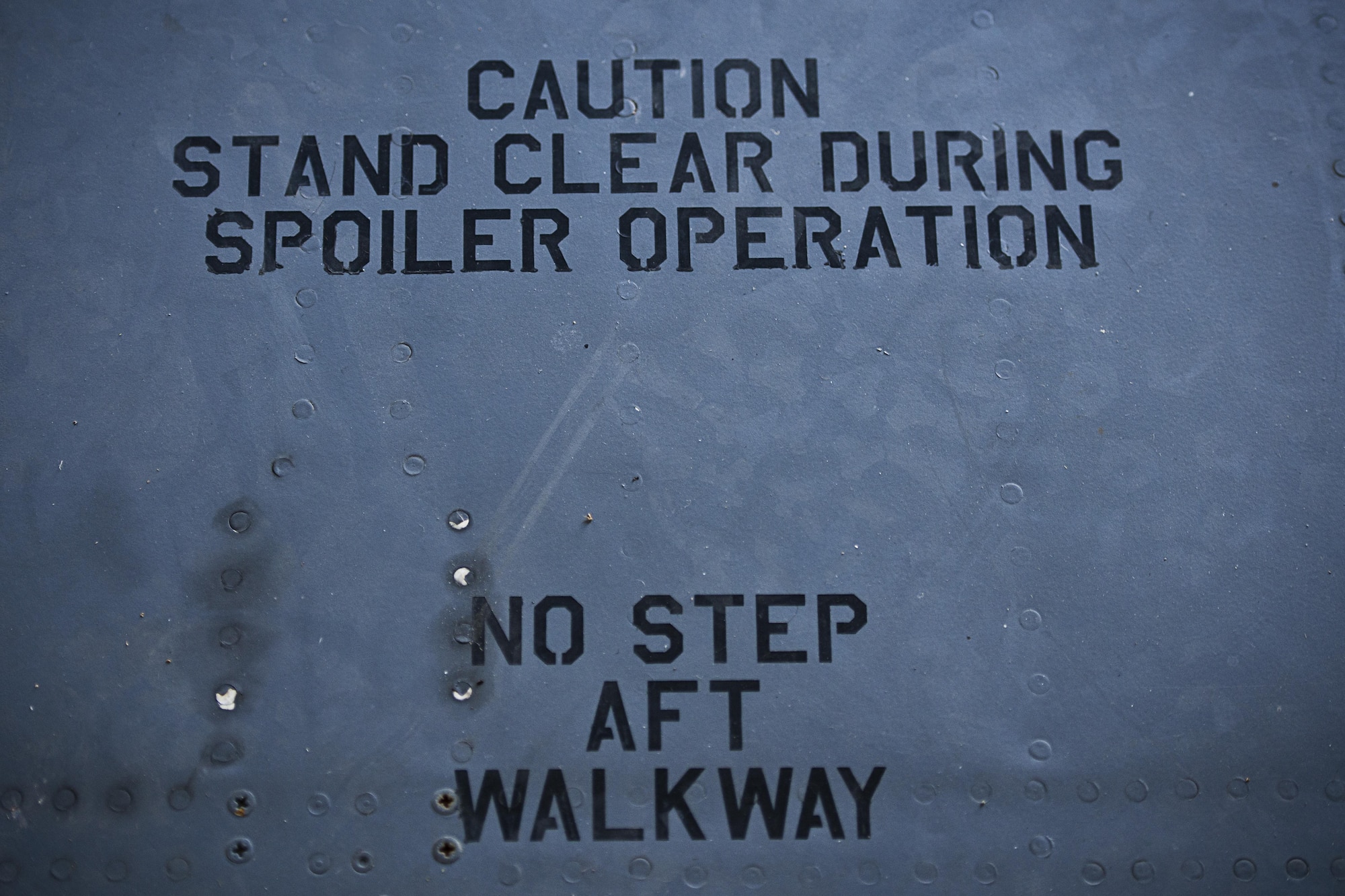 Safety instructions adorn the wing of a B-52H Stratofortress parked at Dock 2 at Minot Air Force Base, N.D., August 2, 2016. For more than 40 years, the B-52 has been the backbone of the manned strategic bomber force for the U.S. (U.S. Air Force photo/Airman 1st Class J.T. Armstrong)