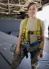 Senior Airman Amanda Scanlan, 5th Maintenance Squadron aircraft structural maintenance, stands atop the wing of a B-52H Stratofortress at Minot Air Force Base, N.D., August 2, 2016. Airmen from the 5th MXS work around the clock to provide B-52 firepower on demand. (U.S. Air Force photo/Airman 1st Class J.T. Armstrong)