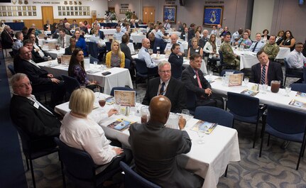 Members of 25th Air Force and the San Antonio Chamber of Commerce listen intently to the mission briefing given by the 25th Air Force Commander, Maj. Gen. Bradford “BJ” Shwedo at JBSA-Lackland, San Antonio, Texas Friday.