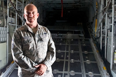 Air Force Senior Master Sgt. Tye Taylor is a maintenance flight chief with the 302nd Airlift Wing and assigned to work on C-130 Hercules aircraft at Peterson Air Force Base, Colo., which are equipped with Modular Airborne Fire Fighting Systems, July 26, 2016. DoD photo by Lisa Ferdinando 