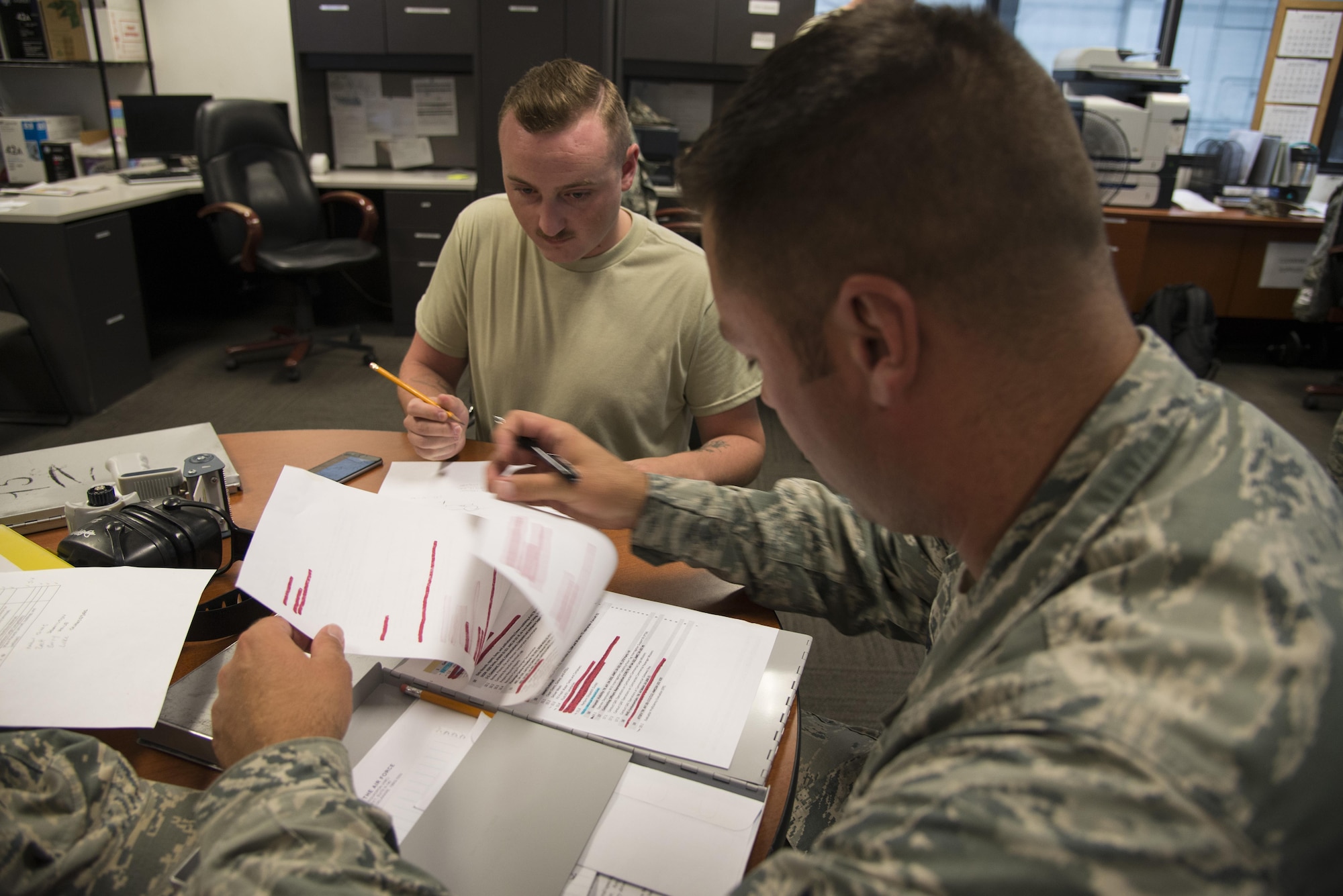 Tech. Sgt. Jesse Foor, 436th Aerial Port Squadron Air Transportation Standardization and Evaluations Program evaluator, observes Senior Airman Evan Hodges, 436th APS special cargo processor, during an ATSEP evaluation, July 26, 2016, at Dover Air Force Base, Del. The 436th APS was selected to launch the AMC pilot ATSEP program July 1. All AMC aerial port squadrons are expected to adopt the program by September, 2016. (U.S. Air Force photo/Senior Airman Aaron J. Jenne.)