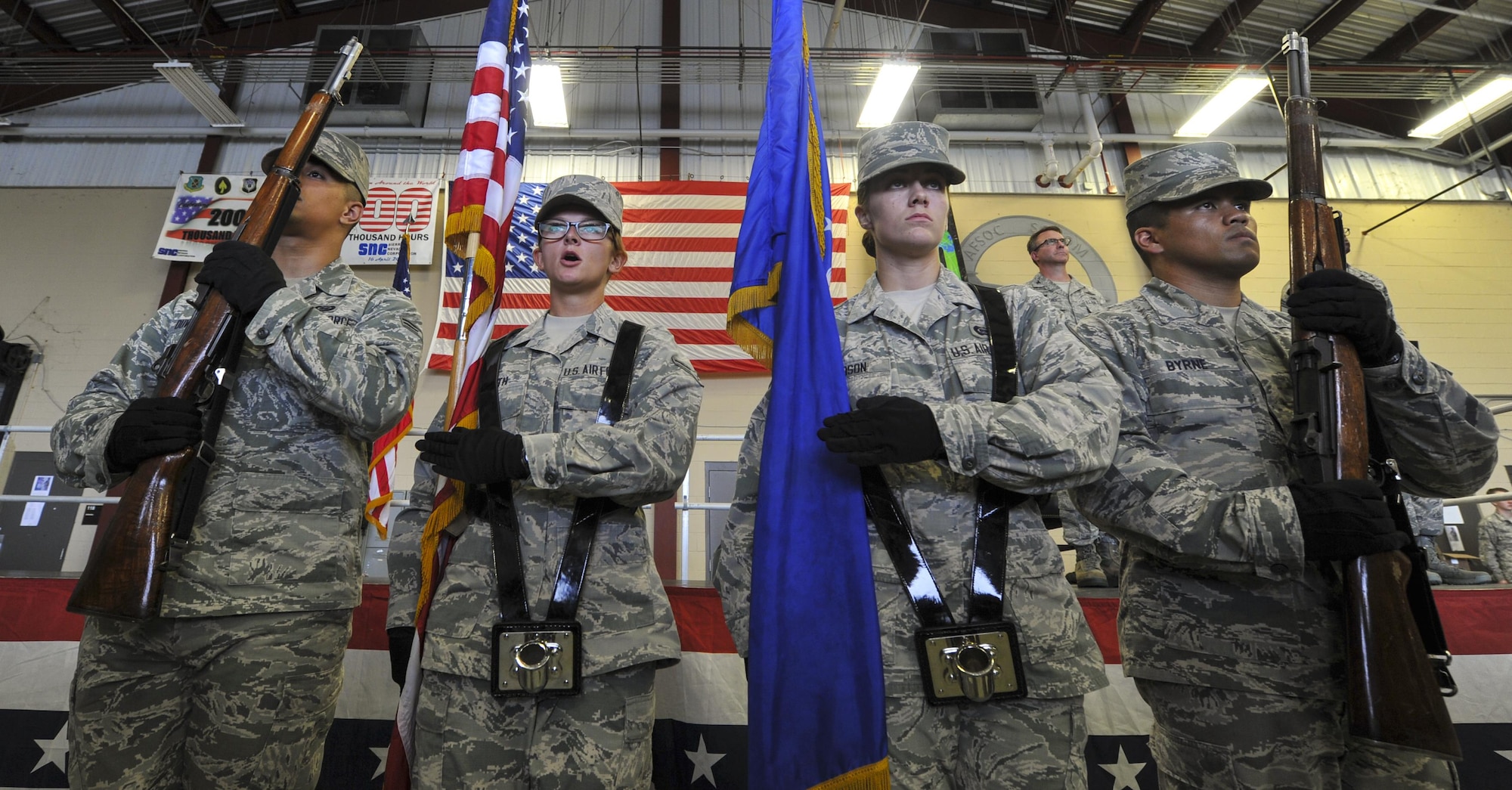 Air Commandos from the Hurlburt Field Honor Guard prepare to post the American flag during a re-designation ceremony at Hurlburt Field, Fla., Aug. 1, 2016. The Honor Guard performed ceremonial duties at the ceremony during which the 11th Intelligence Squadron was re-designated as the 11th Special Operations Intelligence Squadron. (U.S. Air Force photo by Airman Dennis Spain)