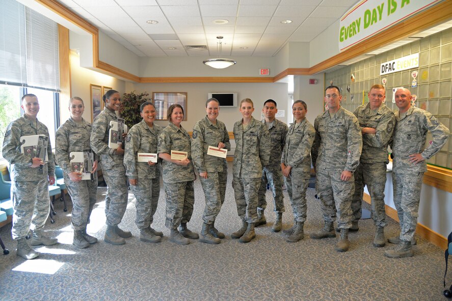 Competitors of the Warrior Chef competition pose for a group photo Aug. 3, 2016, at Malmstrom Air Force Base, Mont. The objective of the competition is to recognize and reward the talented culinary experts for superior performance while enhancing culinary proficiency inside or outside of the missile field. (U.S. Air Force photo/Airman 1st Class Daniel Brosam)
