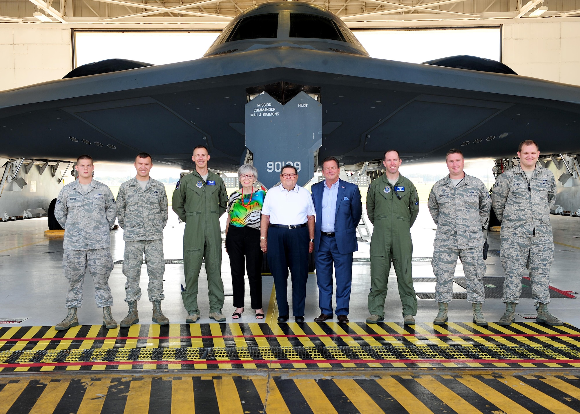 Retired U.S. Air Force Lt. Col. Robert Fortney, center, a former 13th Bomb Squadron (BS) commander, and his family tour the B-2 Spirit during their visit with Lt. Col. Matthew Newell, third from right, the current 13th BS commander, and fellow Team Whiteman members at Whiteman Air Force Base (AFB), Mo., July 26, 2016. During the Cuban Missile Crisis, Fortney was chief of the control division at Barksdale AFB, La. He later transferred to Andersen AFB, Guam as the vice commander from June 1966 through July 1968. While at Andersen, he flew numerous B-52 Stratofortress missions over Vietnam. In 1968, he served as base commander of Blytheville AFB, Ark., until his retirement in June 1971. (U.S Air Force photo by Airman 1st Class Jazmin Smith)
