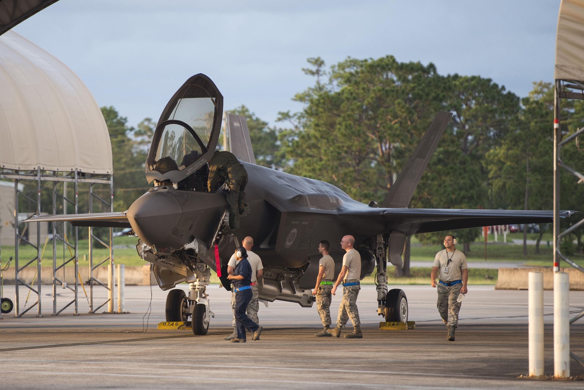 Airmen from the 33rd Aircraft Maintenance Squadron and 58th Aircraft Maintenance Unit ready an F-35A for takeoff during a sortie surge Aug. 2, 2016, at Eglin Air Force Base, Fla. The 33rd Fighter Wing completed 111 sorties during a three-day surge to exercise the readiness of pilots, maintainers and aircraft to meet the needs of high-tempo operations. (U.S. Air Force photo by Senior Airman Stormy Archer)