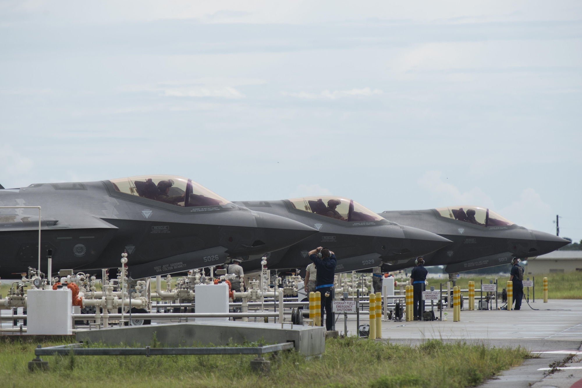 33rd Maintenance Support Squadron Airmen hot pit refuel F-35As during a sortie surge Aug. 2, 2016, at Eglin Air Force Base, Fla. Hot pit refueling allows aircraft to quickly relaunch after completing a sortie by refueling aircraft while their engine is still running. (U.S. Air Force photo by Senior Airman Stormy Archer)