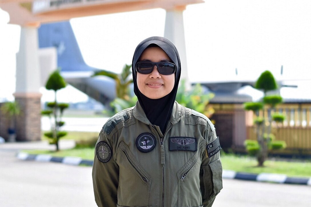 Lt. Col. (Dr.) Amei Farina Bt Abd Rashid, Chief Instructor/Aviation Medicine Specialist, Royal Malaysian Air Force, stops for a photo during the Asia Pacific Military Health Exchange 2016 in Kuantan, Malaysia, Aug. 3, 2016. Co-hosted by U.S. Pacific Command surgeon and the Malaysian Armed Forces Health Services Division, the Asia Pacific Military Health Exchange (AMPHE) 2016 included plenary sessions focused on a variety of medical professions, as well as breakout sessions specific to ground, air, and maritime forces in the Indo-Asia- Pacific region. APMHE 16 takes place from Aug 1-5, 2016 and involves nearly 500 participants from 27 different countries focused on global health interoperability. (Department of Defense Photo by Master Sgt. Todd Kabalan)

“It’s been going very well and what I really appreciate the most is that we get to collaborate on things like medivac and get new information from the presentations, especially the updates on Aero-physiology, and now we have collaboration with not only the U.S., but other countries as well.”