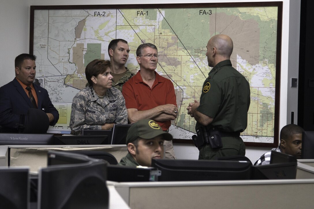 Gen. Lori Robinson (center-left), Commander of NORAD and USNORTHCOM, meets with members of the Customs and Border Protection at Joint Task Force - West in Tucson, Arizona, July 21, 2016.  Gen. Robinson was briefed on the mission and challenges on the U.S. border. She also toured the U.S. Southern border via helicopter. NORTHCOM is a mission partner with the CBP.
Joint Task Force – West (JTF-W) is part of the Department of Homeland Security's Southern Border and Approaches Campaign Plan. This joint task force structure focuses cross-departmental and integrated counter-network operations on strategic objectives across four geographical corridors. Area networks within the JTF-W Joint Operating Area include supporting components, Department of Defense Commands, International, State, Local, and Tribal entities.  JTF-W efforts are designed to extend the border and institutionalize an asymmetric operational agility, effectiveness, and impact against targeted Transnational Criminal Organization (TCO) networks.