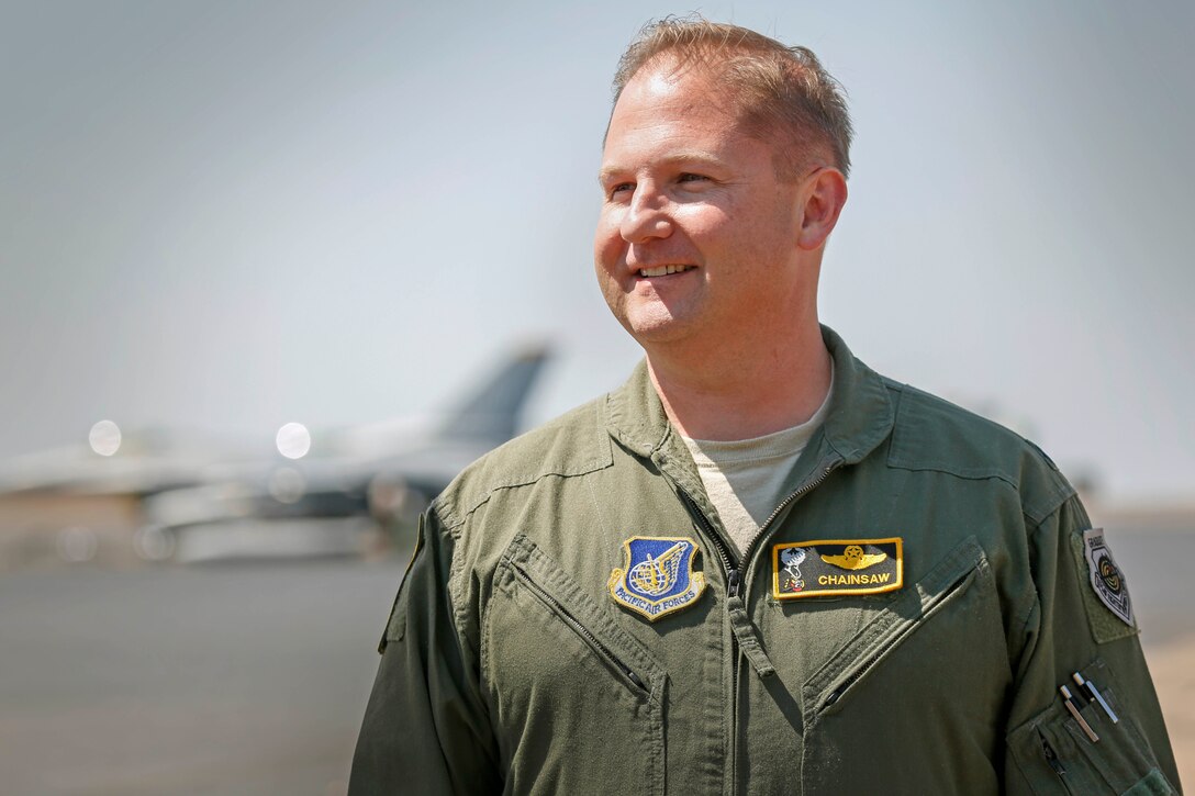 U.S. Air Force Lt. Col. Mark Heusinkveld, 14th Expeditionary Fighter Squadron commander, assigned to Misawa Air Base, Japan, stops for a photo during Pitch Black 16, in Darwin, Australia, Aug. 2, 2016. Pitch Black is a biennial multinational air warfare exercise hosted by the Royal Australian Air Force (RAAF) that focuses on offensive counter air and defensive counter air combat in a simulated war environment. (Australian Defence Force photo by Cpl. Casey Gaul)