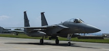 A U.S. Air Force F-15 Eagle assigned to the 67th Fighter Squadron returns from a flight July 29, 2016, at Kadena Air Base, Japan. This particular Eagle reached the 10,000 flight hours mark, making it the first F-15 on Kadena to reach this point. (U.S. Air Force photo by Airman 1st Class Lynette M. Rolen)