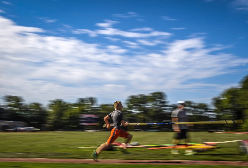 Andrew Bronson, 14, son of 628th Air Base Wing Command Chief Master Sgt. Mark A. Bronson, practices the pole vault at the Park West Recreation Center in Mt. Pleasant, S.C., July 20, 2016. Bronson was preparing for the USA Track and Field National Junior Olympics which took place in Sacramento, Calif., July 25-31, 2016. (U.S. Air Force photo by Staff Sgt. Marianique Santos/Released)