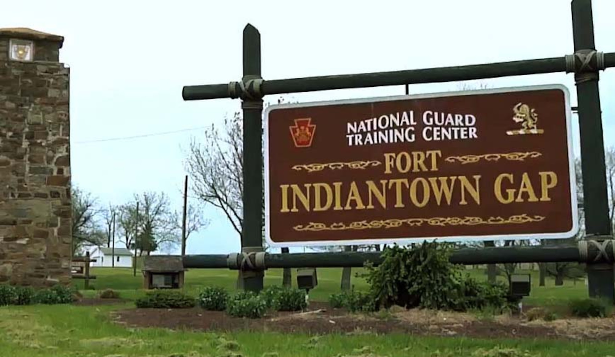 A sign sits outside of the National Guard Training Center at Fort Indiantown Gap in Annville, Pa., Aug. 4, 2014. FITG hosts both Army and Air Guardsmen and function as the National Guard headquarters for members of the commonwealth. (U.S. Air National Guard photo by Master Sgt. George Roach)