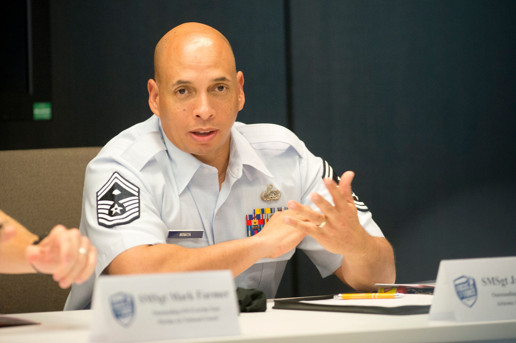 Senior Master Sgt. Jack Minaya, a first sergeant from the 214th Reconnaissance Squadron, 162nd Wing, of the Arizona Air National Guard and the ANG Outstanding First Sergeant of the Year, answers a question during the Focus on the Force Week's Enlisted Field Advisory Council meeting. Focus on the Force Week is a series of events highlighting the importance of professional development for Airmen at all levels, and the recognition of accomplishments throughout the enlisted corps. The other OAY winners are Staff Sgt. Jennifer Masters, Airman of the Year; Tech. Sgt. Nicholas Jewell, Non-Commissioned Officer of the Year; and Senior Master Sgt. Mark Farmer, Senior Non-Commissioned Officer of the Year. The OAY Airmen bring the perspective of the 91,000 enlisted Airmen across the ANG to address challenges facing the enlisted force. (U.S. Air National Guard photo by Master Sgt. Marvin R. Preston)