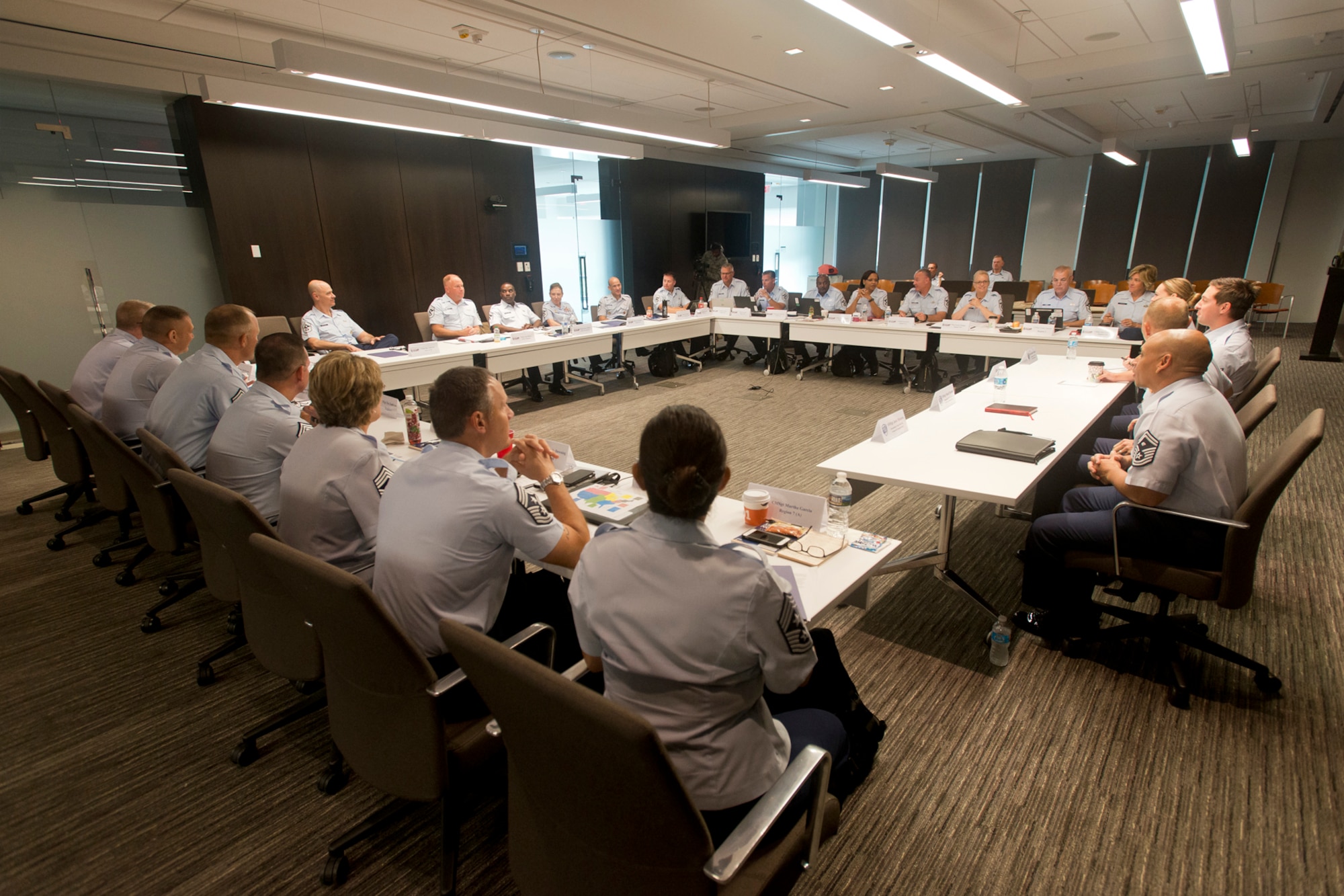 The Air National Guard Outstanding Airmen of the Year deliver opening remarks during the Focus on the Force Week's Enlisted Field Advisory Council meeting. Focus on the Force Week is a series of events highlighting the importance of professional development for Airmen at all levels, and the recognition of accomplishments throughout the enlisted corps. The OAY winners are Staff Sgt. Jennifer Masters, Airman of the Year; Tech. Sgt. Nicholas Jewell, Non-Commissioned Officer of the Year; Senior Master Sgt. Mark Farmer, Senior Non-Commissioned Officer of the Year; and Senior Master Sgt. Jack Minaya, First Sergeant of the Year. The OAY Airmen bring the perspective of the 91,000 enlisted Airmen across the ANG to address challenges facing the enlisted force. (U.S. Air National Guard photo by Master Sgt. Marvin R. Preston)