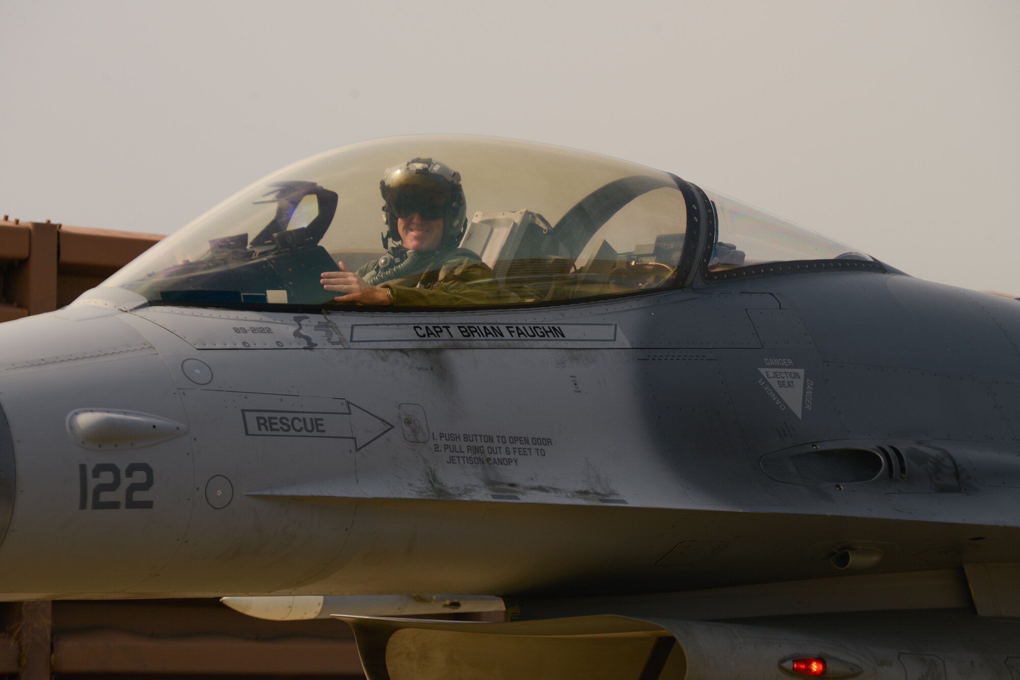 Col. Brian Carr, 51st Fighter Wing vice commander, poses for a photo following his final flight in an F-16 Fighting Falcon at Osan Air Base, Republic of Korea, Aug. 4, 2016. Carr has served as the fighter wing’s vice commander since August 2014. (U.S. Air Force photo by Senior Airman Dillian Bamman)