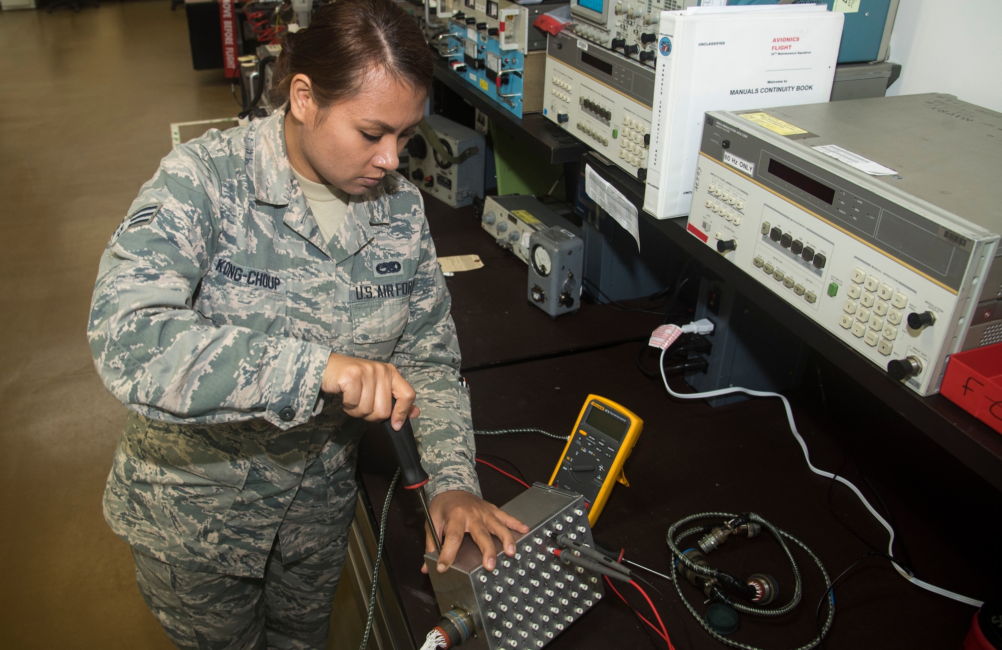 U.S. Air Force Senior Airman Nary Kong-Choup, a team member with the 35th Maintenance Squadron avionics intermediate section electronic warfare section, assembles a breakout box at Misawa Air Base, Japan, Aug. 1, 2016. Kong-Choup was one of seven Airmen who took the initiative on building this device, saving time and requiring less manpower to operate. The apparatus connects to parts on F-16 Fighting Falcons, called line replacement units, and inspects the integrity of electrical pathways. (U.S. Air Force photo by Senior Airman Jordyn Fetter)