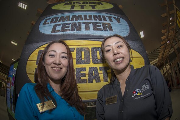 Miyuki Taneichi, left, and Miyako Sugiyama, right, pose for a photo in front of the 35th Force Support Squadron’s Community Center and Information, Tickets & Travel offices at Misawa Air Base, Japan, Aug. 4, 2016. Miyuki is the Community Center acting director and Miyako is the ITT manager. The two 35th FSS programs each won 2015 Best in the Air Force as A1 programs bringing the award home to Misawa. (U.S. Air Force photo by Staff Sgt. Benjamin W. Stratton)