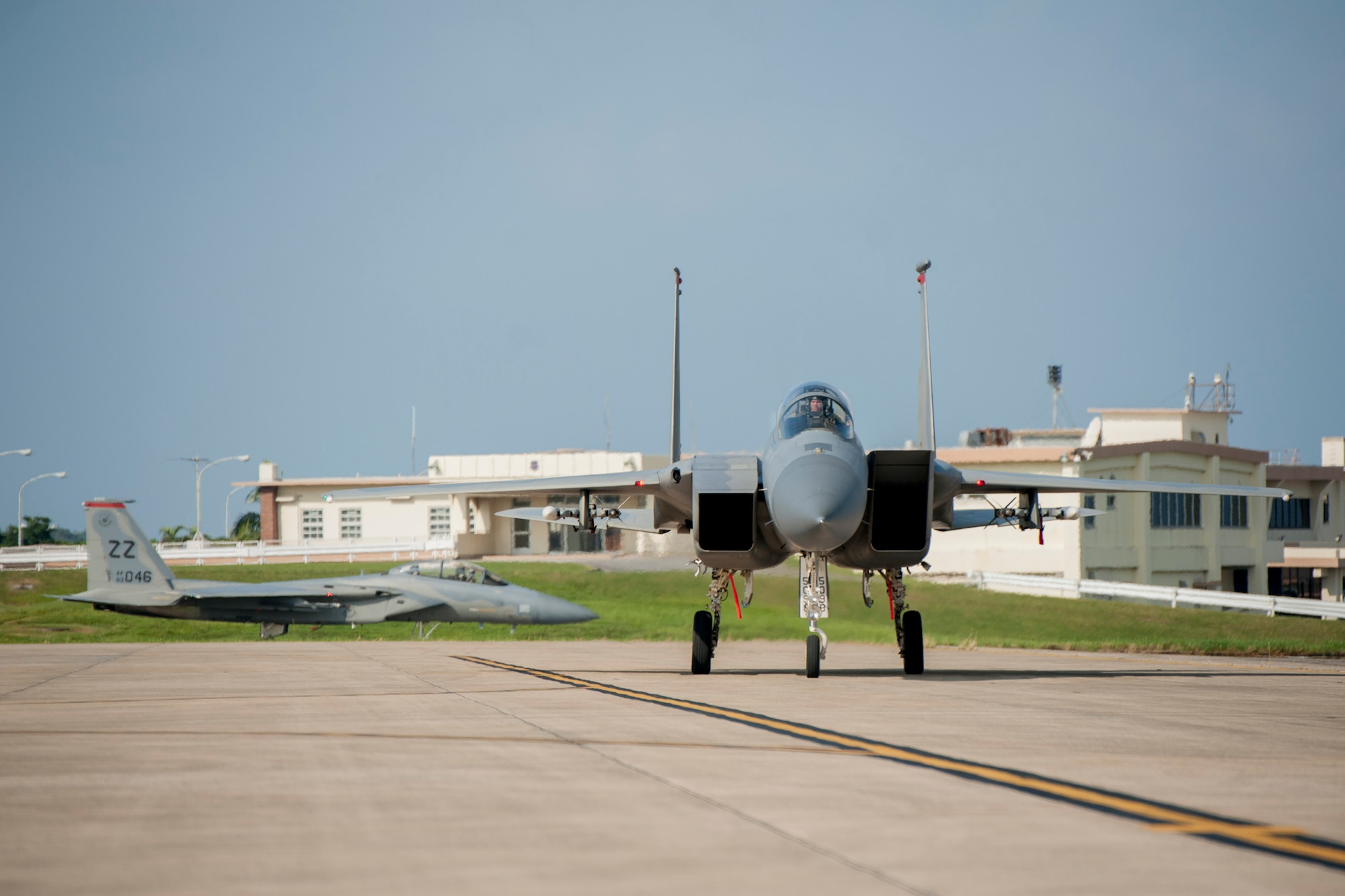 Aircraft assigned to the 67th Fighter Squadron taxi toward a refueling point July 28, 2016, at Kadena Air Base, Japan. Pilots fly regularly to hone their skills in the event they are called to defend Okinawa and Japan from enemy attack within the Indo-Asia Pacific region. (U.S. Air Force photo by Senior Airman Peter Reft)