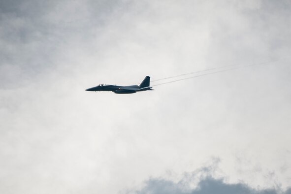 A 44th Fighter Squadron F-15 Eagle performs a flyby over the flight line July 28, 2016, at Kadena Air Base, Japan. The F-15 Eagle is a versatile combat platform for air-intercept engagements utilizing an arsenal which includes an M-61A1 cannon, AIM-9 sidewinder missiles, and AIM-120 advanced medium range air-to-air missiles. (U.S. Air Force photo by Senior Airman Peter Reft)