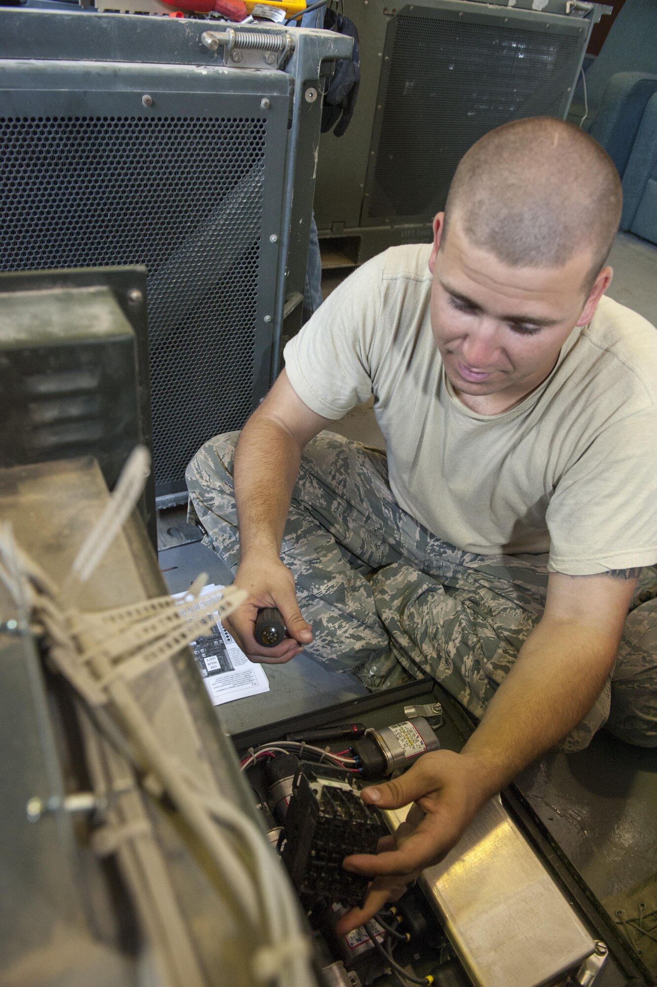 U.S. Air Force Senior Airman Todd Gonsalves, 786th Civil Engineer Squadron (CES) heating, ventilation and air conditioning (HVAC) journeyman, repairs an air conditioning unit July 28, 2016, at Incirlik Air Base, Turkey. HVAC repair technicians came to Incirlik as a result of a request for forces from the 39th CES after the July 15, 2016 failed Turkish military coup. (U.S. Air Force photo by Staff Sgt. Jack Sanders)