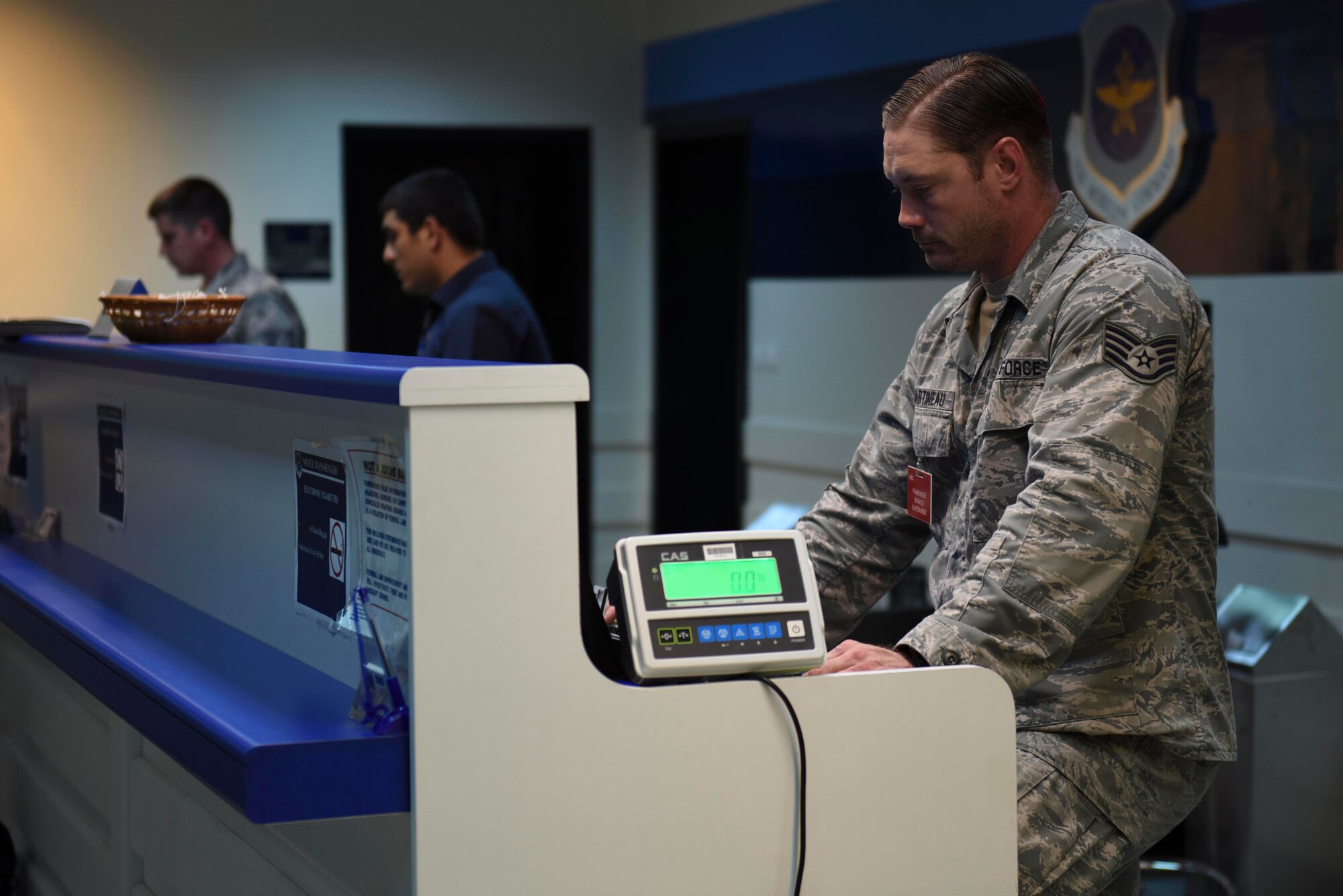 U.S. Air Force Tech. Sgt. William Martineau, 728th Air Mobility Squadron passenger service supervisor, reads a computer screen July 13, 2016, at Incirlik Air Base, Turkey. The customer service desk is responsible for issuing tickets, checking in passengers’ baggage and ensure the travelers get through the gate to leave on time. (U.S. Air Force photo by Airman 1st Class Devin M. Rumbaugh)