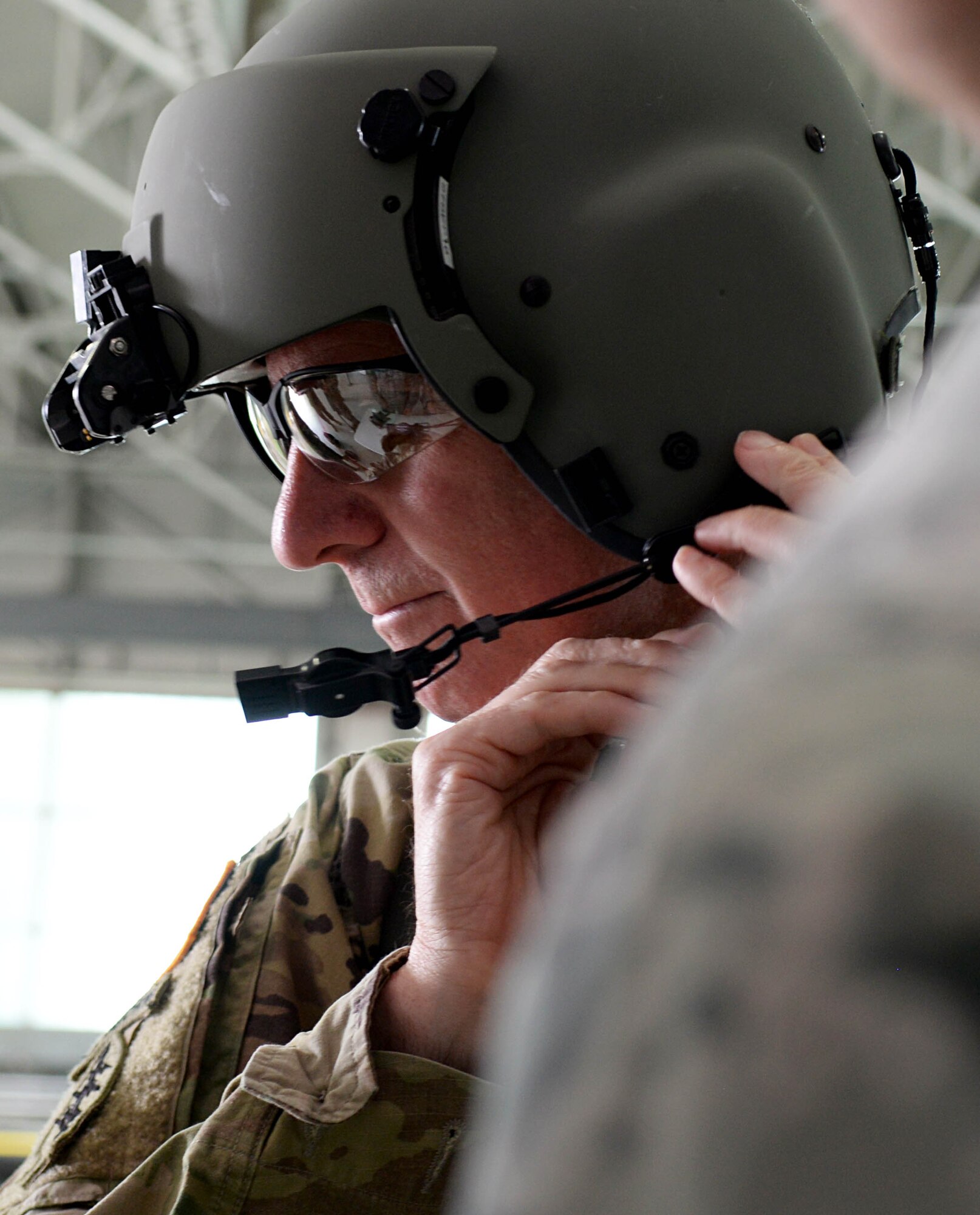 U.S. Army Maj. Gen. Mark C. Schwartz, commander of the Special Operations Command-Europe, prepares for a flight Aug. 1, 2016, on RAF Mildenhall, England. The flight was the capstone of his visit with the 352nd Special Operations Wing. (U.S. Air Force photo by Airman 1st Class Tenley Long)