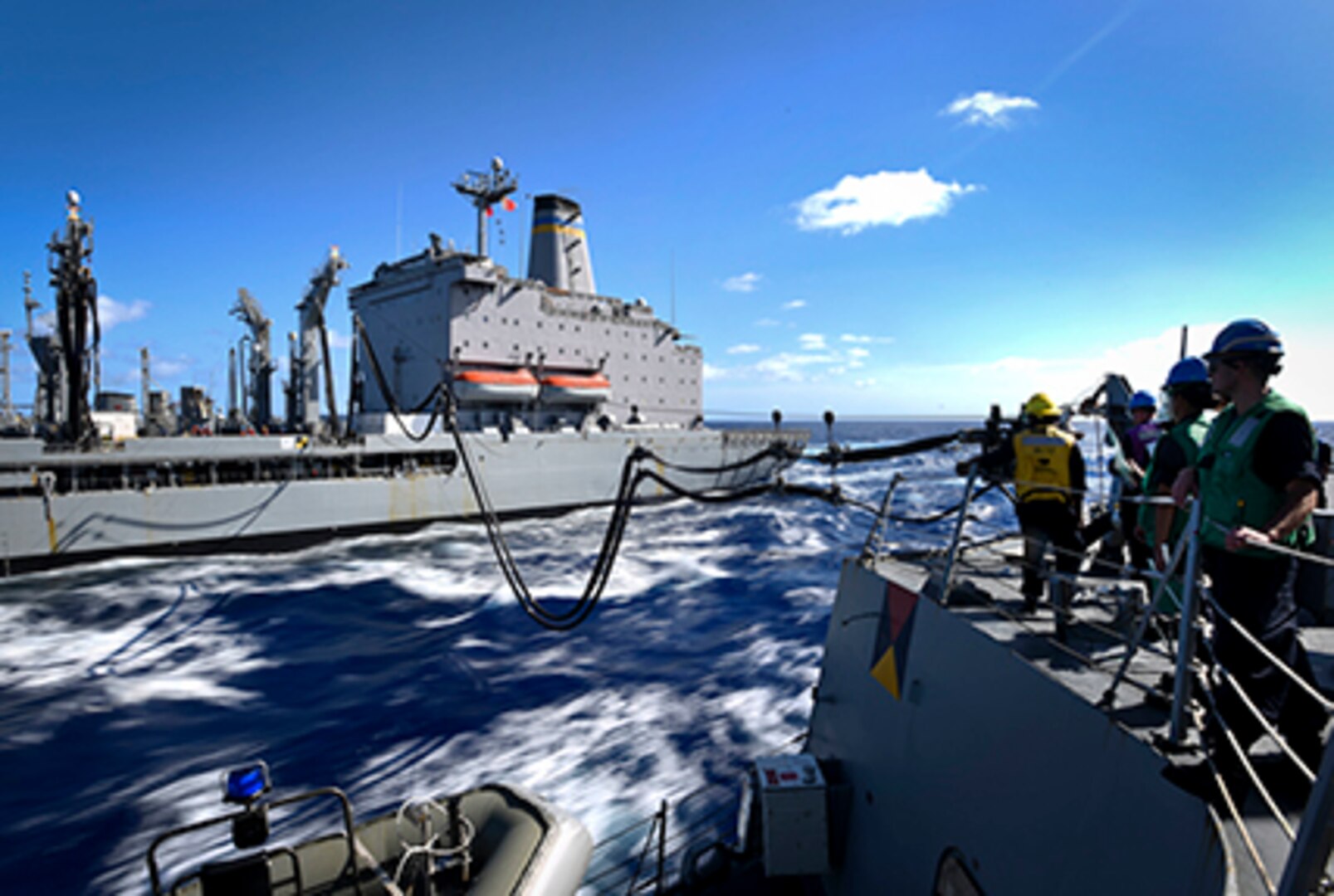 PACIFIC OCEAN (July 29, 2016) – Sailors assigned to the Arleigh Burke-class guided-missile destroyer USS Shoup (DDG 86) conduct an underway replenishment with the Military Sealift Command fleet replenishment oiler USNS Rappahannock (T-AO 204), during Rim of the Pacific 2016. Twenty-six nations, more than 40 ships and submarines, more than 200 aircraft and 25,000 personnel are participating in RIMPAC from June 30 to Aug. 4, in and around the Hawaiian Islands and Southern California.  The world's largest international maritime exercise, RIMPAC provides a unique training opportunity that helps participants foster and sustain the cooperative relationships that are critical to ensuring the safety of sea lanes and security on the world's oceans. RIMPAC 2016 is the 25th exercise in the series that began in 1971. 