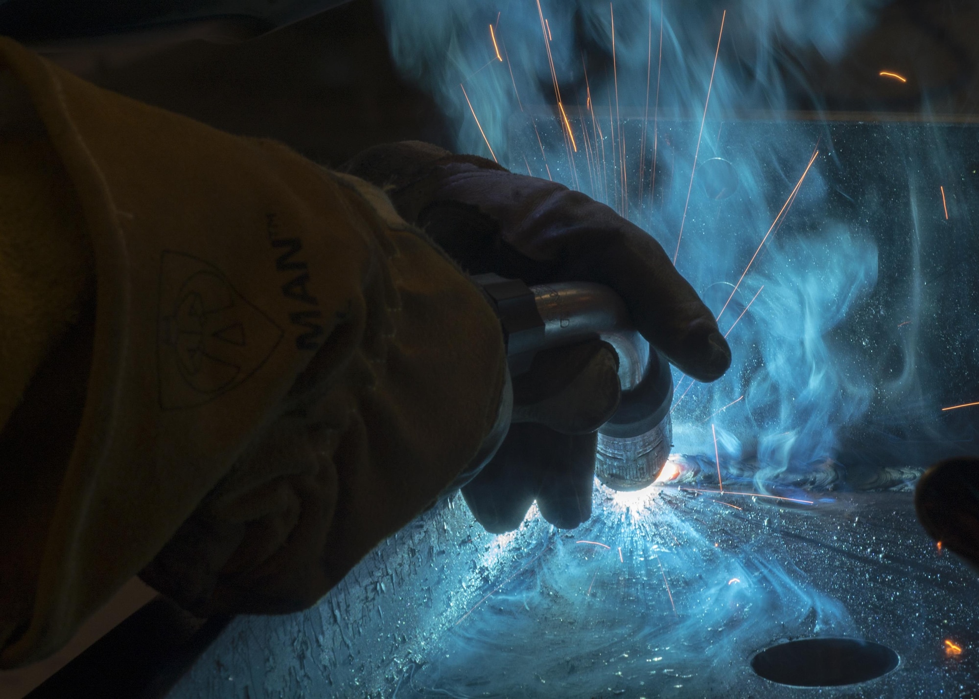 Senior Airman Jeffrey Jenkins, 31st Maintenance Squadron metals technology craftsman, welds a radar bracket for the incoming 606th Air Control Squadron, Aug. 2, 2016, at Aviano Air Base, Italy. The 31st MXS metals technology Airmen are responsible for welding, fabricating and creating custom builds for F-16 Fighting Falcons assigned to the wing. (U.S. Air Force photo by Airman 1st Class Cory W. Bush/Released)