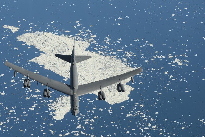 A B-52 Stratofortress, from Minot Air Force Base, N.D., flies near the North Pole, July 31, 2016, during Polar Roar, a strategic deterrence exercise. The rapid global mobility and air refueling capabilities of Air Mobility Command and the 305th Air Mobility Wing ensured the B-52’s were able to complete their mission. (U.S. Air Force photo/Senior Airman Joshua King)