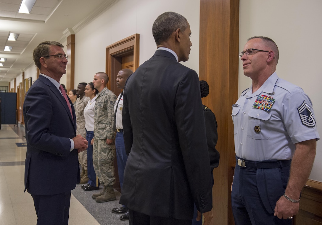 President Barack Obama and Defense Secretary Ash Carter thank service members after a news conference at the Pentagon, Aug. 4, 2016. DoD photo by Air Force Tech. Sgt. Brigitte N. Brantley