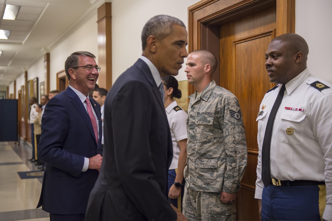 President Barack Obama and Defense Secretary Ash Carter thank service members after a news conference at the Pentagon, Aug. 4, 2016. DoD photo by Air Force Tech. Sgt. Brigitte N. Brantley