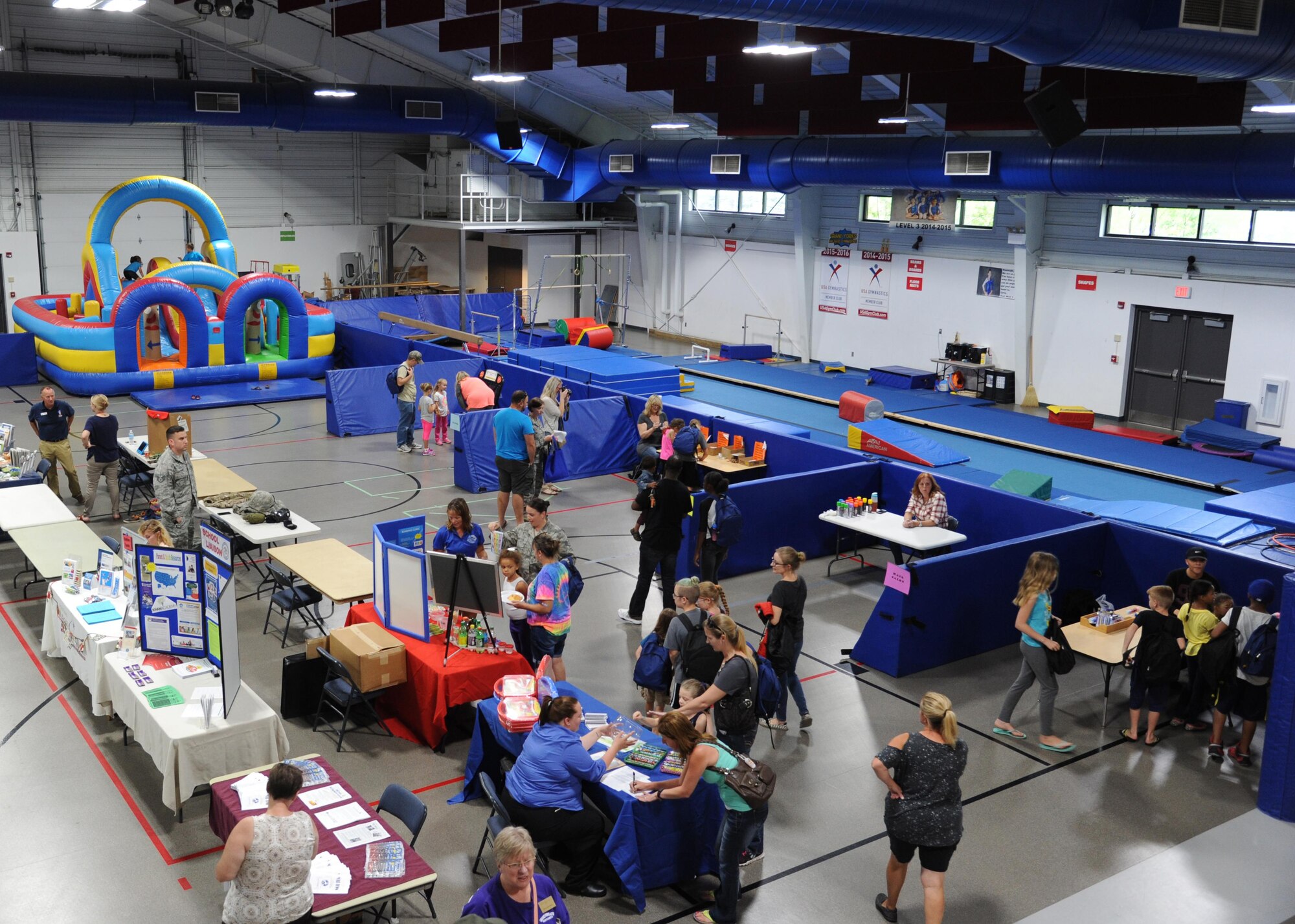 The School Liaison Office hosted a back-to-school picnic and the Operation Homefront Back-to-School Brigade at Liberty Square August 4, 2016, on Grand Forks Air Force Base, N.D. The event provided an opportunity for new parents and children to meet other families. (U.S. Air Force photo by Senior Airman Ryan Sparks/Released)