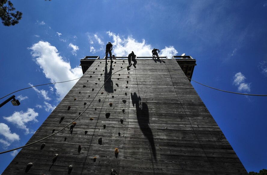 Junior Reserve Officers' Training Corps cadets rappel down a 40-foot tower at Hurlburt Field, Fla., July 20, 2016. From July 18-22, more than 60 Junior ROTC cadets from nearby high schools visited base for their Summer Leadership School - a course designed to teach cadets leadership, confidence and other traits. (U.S. Air Force photo by Airman 1st Class Joseph Pick)