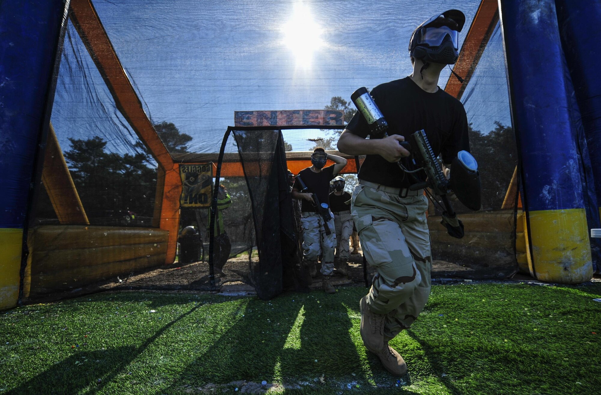 A Junior Reserve Officers' Training Corps cadet sprints into a paintball arena at Hurlburt Field, Fla., July 21, 2016. From July 18-22, more than 60 Junior ROTC cadets from nearby high schools visited base for their Summer Leadership School - a course designed to teach cadets leadership, confidence and other traits. (U.S. Air Force photo by Airman 1st Class Joseph Pick)