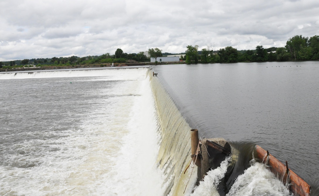 Hudson River water spilling over the dam portion of the Troy Lock and Dam in Troy, New York. 