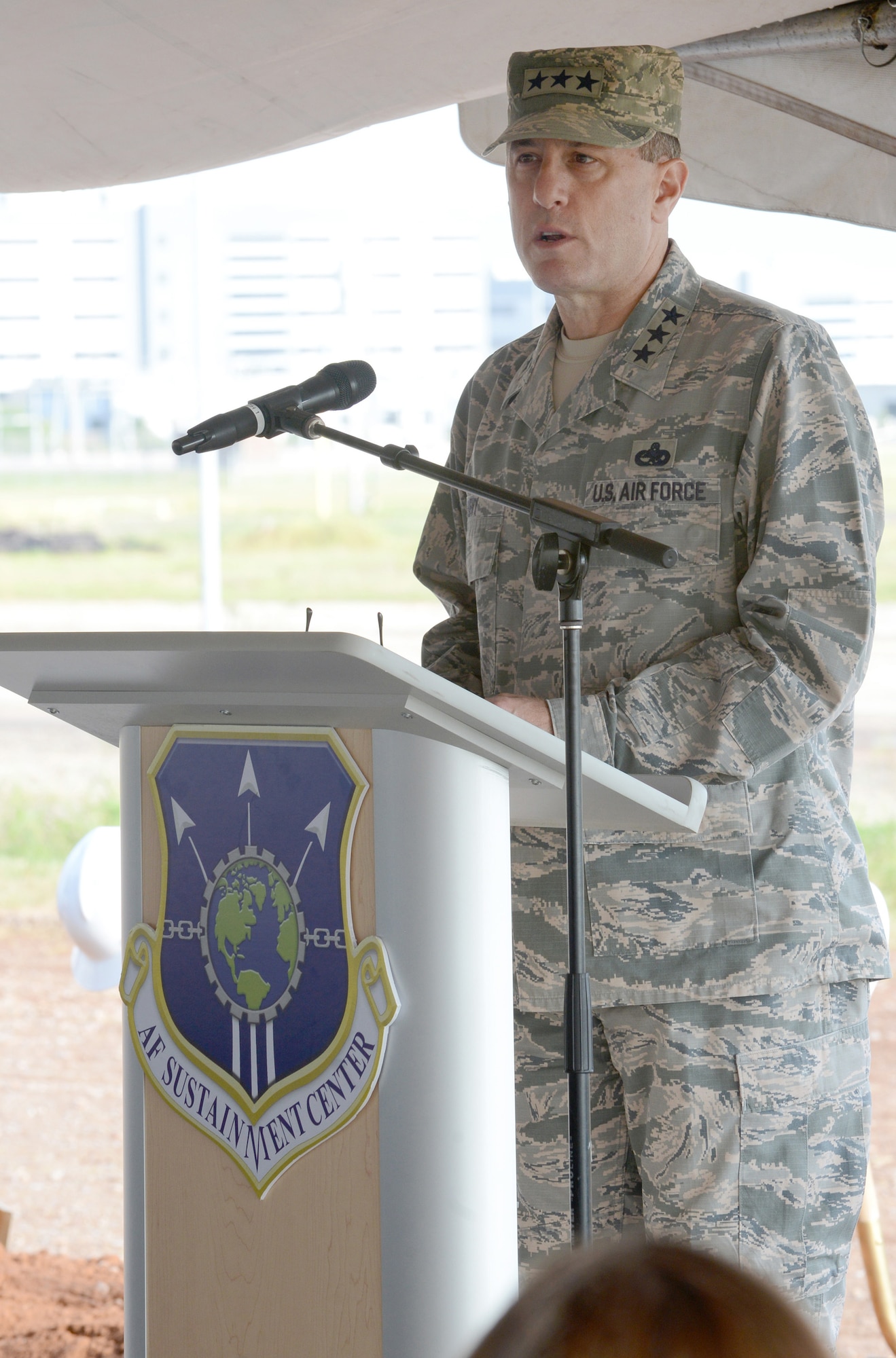 Air Force Sustainment Center Commander Lt. Gen. Lee K. Levy II addresses the crowd at the KC-46A Sustainment Campus groundbreaking ceremony July 26. (Air Force photo by Kelly White)