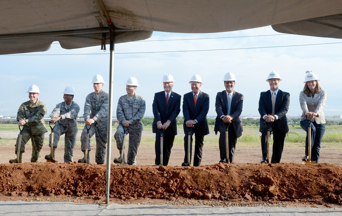 Ground was officially broken July 26 on the new KC-46A Sustainment Campus. Participating in the groundbreaking ceremony are, from left, Col. Christopher Hussin, district commander, U.S. Army Corps of Engineers Tulsa District; Col. Stephanie Wilson, 72nd Air Base Wing commander; Brig. Gen. Duke Richardson, KC-46A Program executive officer, Air Force Life Cycle Management Center; Lt. Gen. Lee K. Levy, Air Force Sustainment Center commander; U.S. Rep Tom Cole, 4th District of Oklahoma; Roy Williams, Greater OKC Chamber president and chief executive officer; Randy Brown, Air Force Civil Engineer Center director, Joint Base San Antonio, Texas; Jay McQuillen, president of Garney Federal Inc.; and Christine McGuire, Contrack-Watts chief operating officer. (Air Force photo by Kelly White)