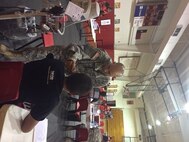 U.S. Army Reserve U.S. Army Reserve Sgt. Osvaldo Vargas, a medical logistics sergeant for the 804th Medical Brigade, takes a reading from a patient during Operation Lone Star at the Academy for Academic Enhancement Middle School in Rio Grande City, Texas on July 25, 2016. Operation Lone Star is one of the Innovative Readiness Training events in a joint effort between the Texas Department of State Health Services, the Texas State Guard and the U.S. Army Reserve which provides real-world training in a joint civil-military environment while delivering world class medical care to the people of south Texas from July 25-29, 2016. (U.S. Army photo by Spc. Curtis Eddings/released)