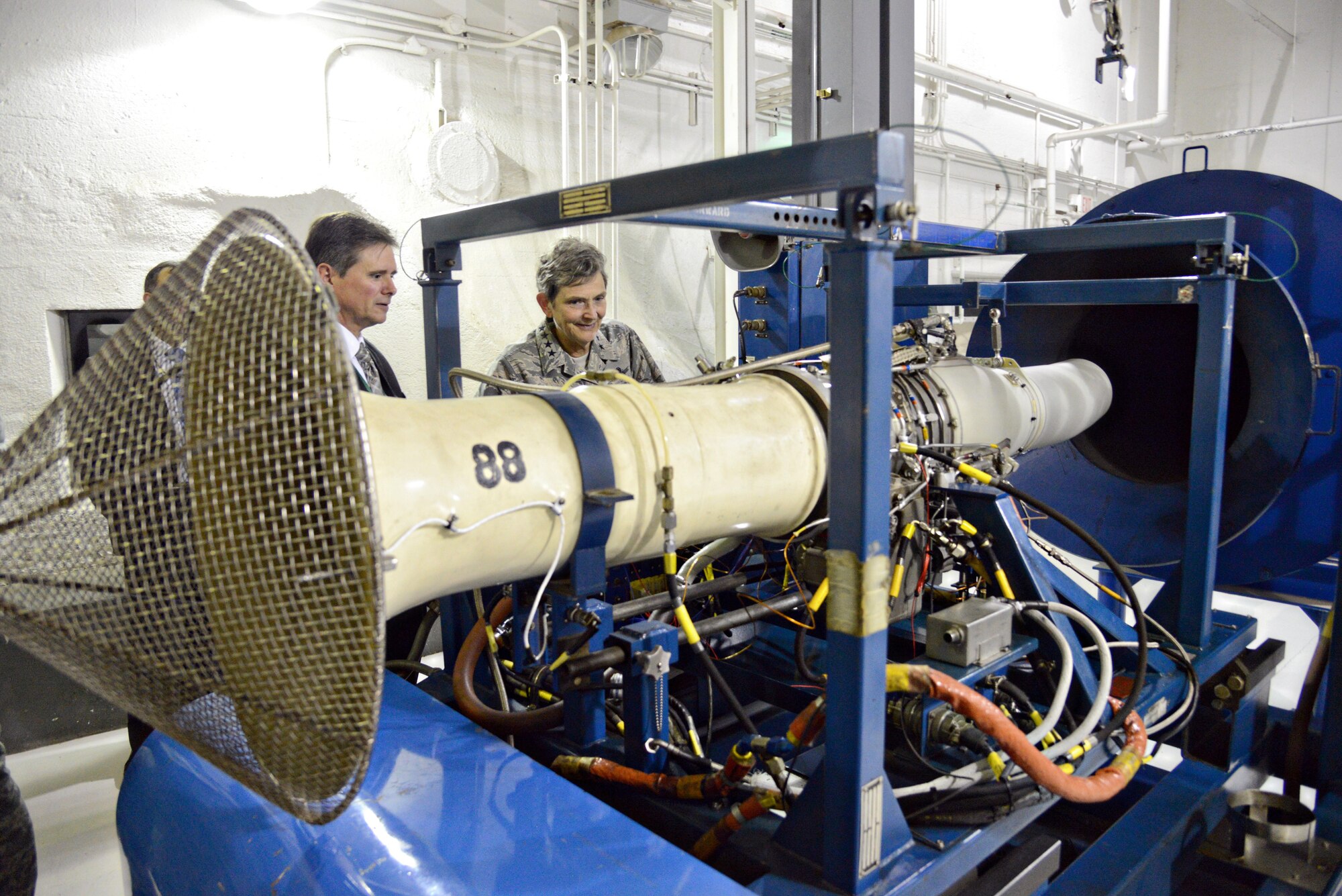 Steve Stoner, deputy director for the 76th Propulsion Maintenance Group, left, discusses the F107 engine’s test cell operations with Air Force Materiel Command
Commander Gen. Ellen Pawlikowski during a July 18 visit to Tinker Air Force Base.